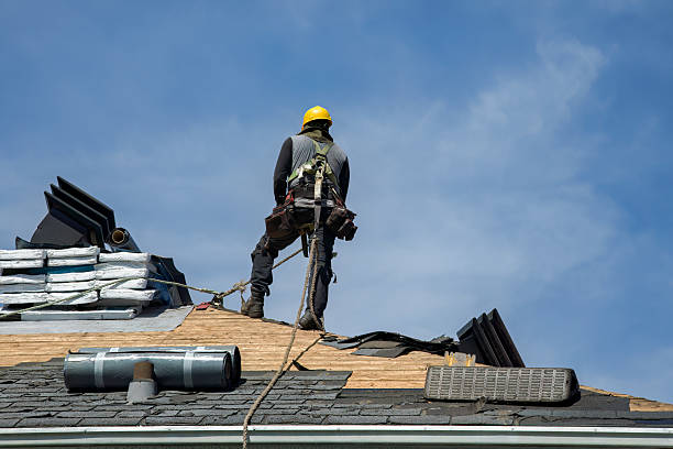 Professional Gutter Installation technician working in Bourbon, IN
